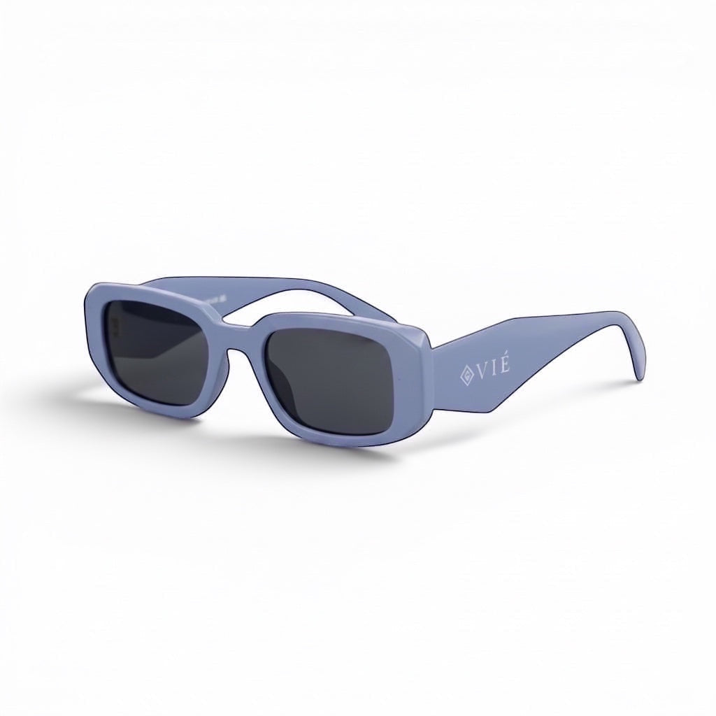 EVIE EYEWEAR Modelo Oréa rectangular sunglasses in matte blue with dark grey UV protective lenses and engraved logo on the temple.