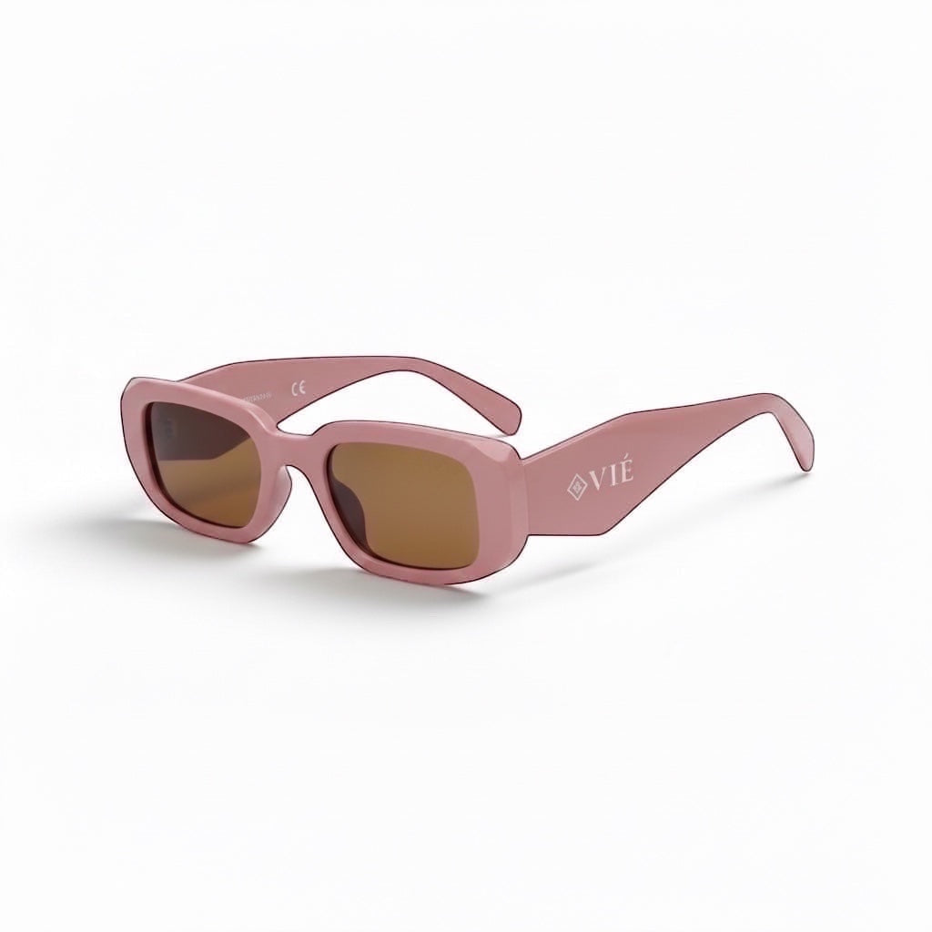 EVIE EYEWEAR Modelo Oréa pink rectangular sunglasses with matte finish and brown UV protective lenses. Logo engraved on the temple.