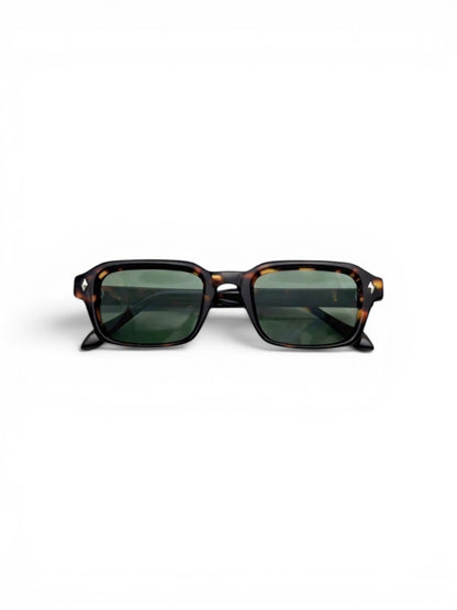 EVIE EYEWEAR OSLO CAREY rectangular sunglasses with tortoiseshell finish, gold logo, and dark UV-protective lenses.