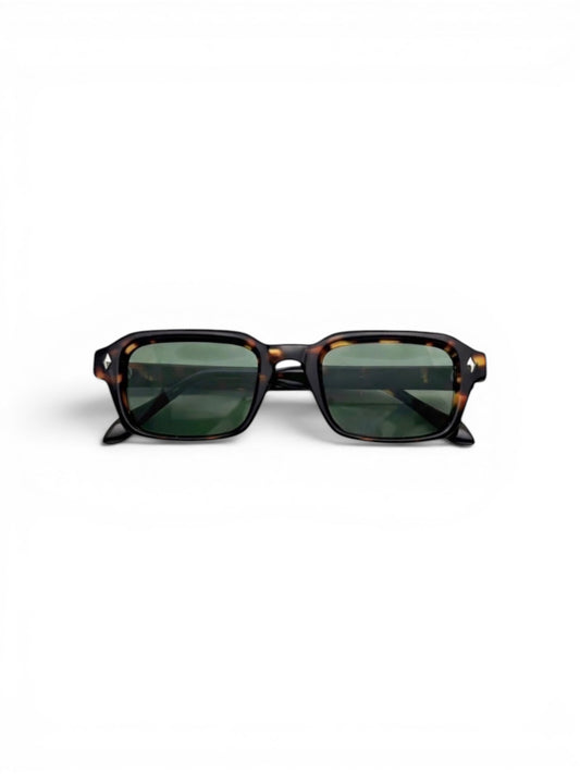 EVIE EYEWEAR OSLO CAREY rectangular sunglasses with tortoiseshell finish, gold logo, and dark UV-protective lenses.
